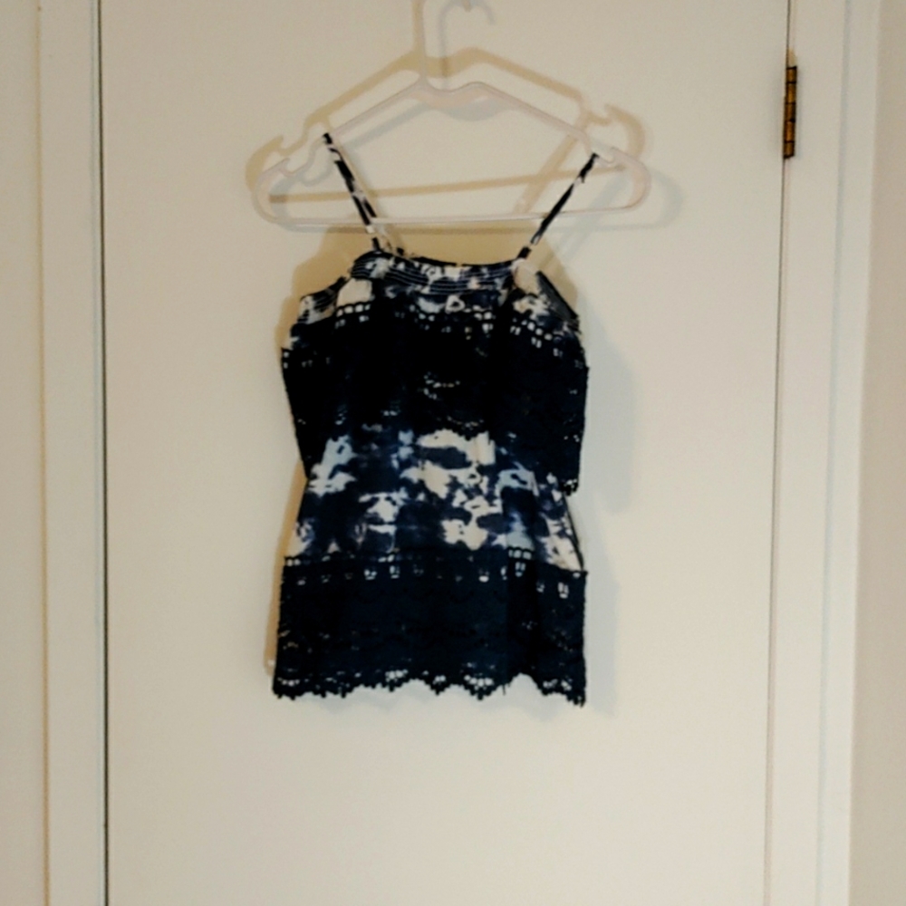 A Spanish style crochet type top.